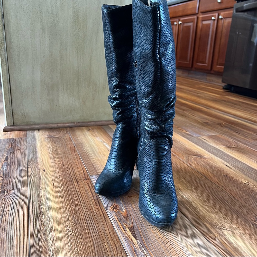 Black snake skin heeled boots